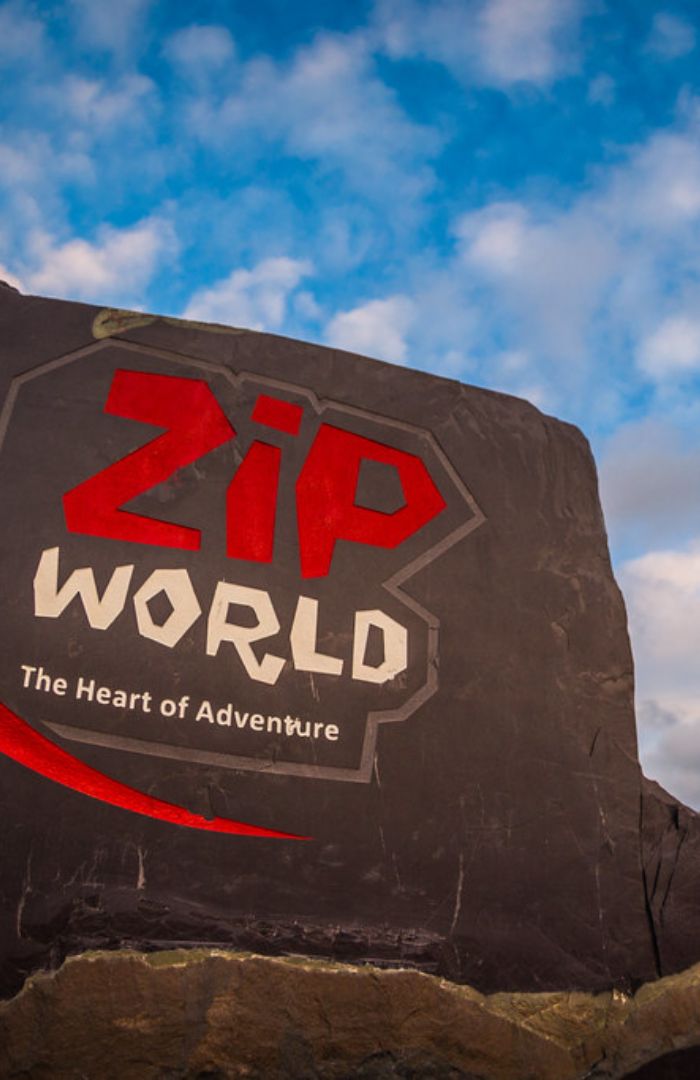 Zip world logo on a rock face
